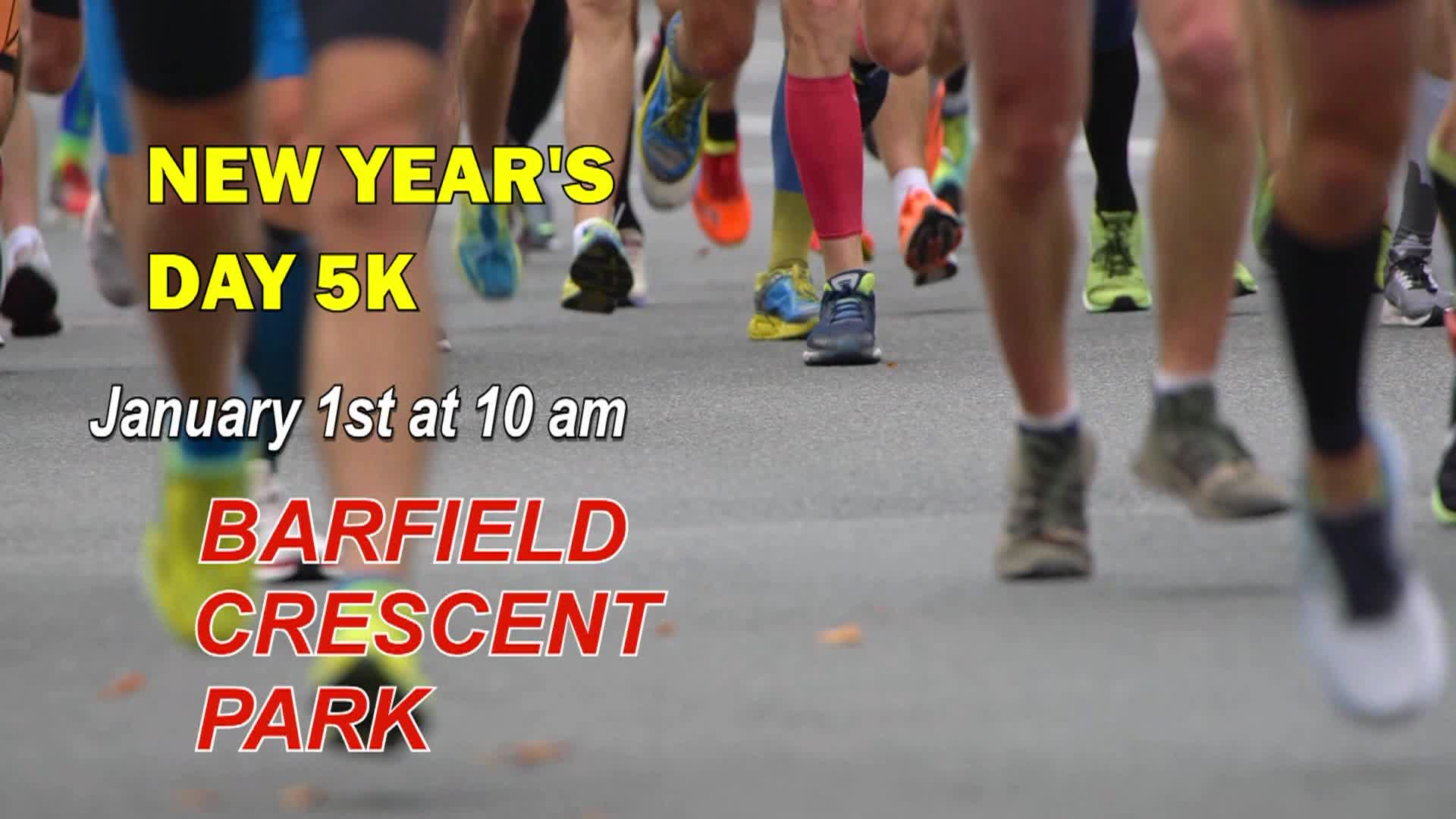 a close up of runner's legs and feet running in a marathon