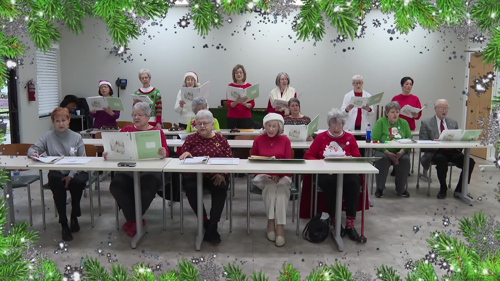 Group of seniors signing Christmas songs at St. Clair