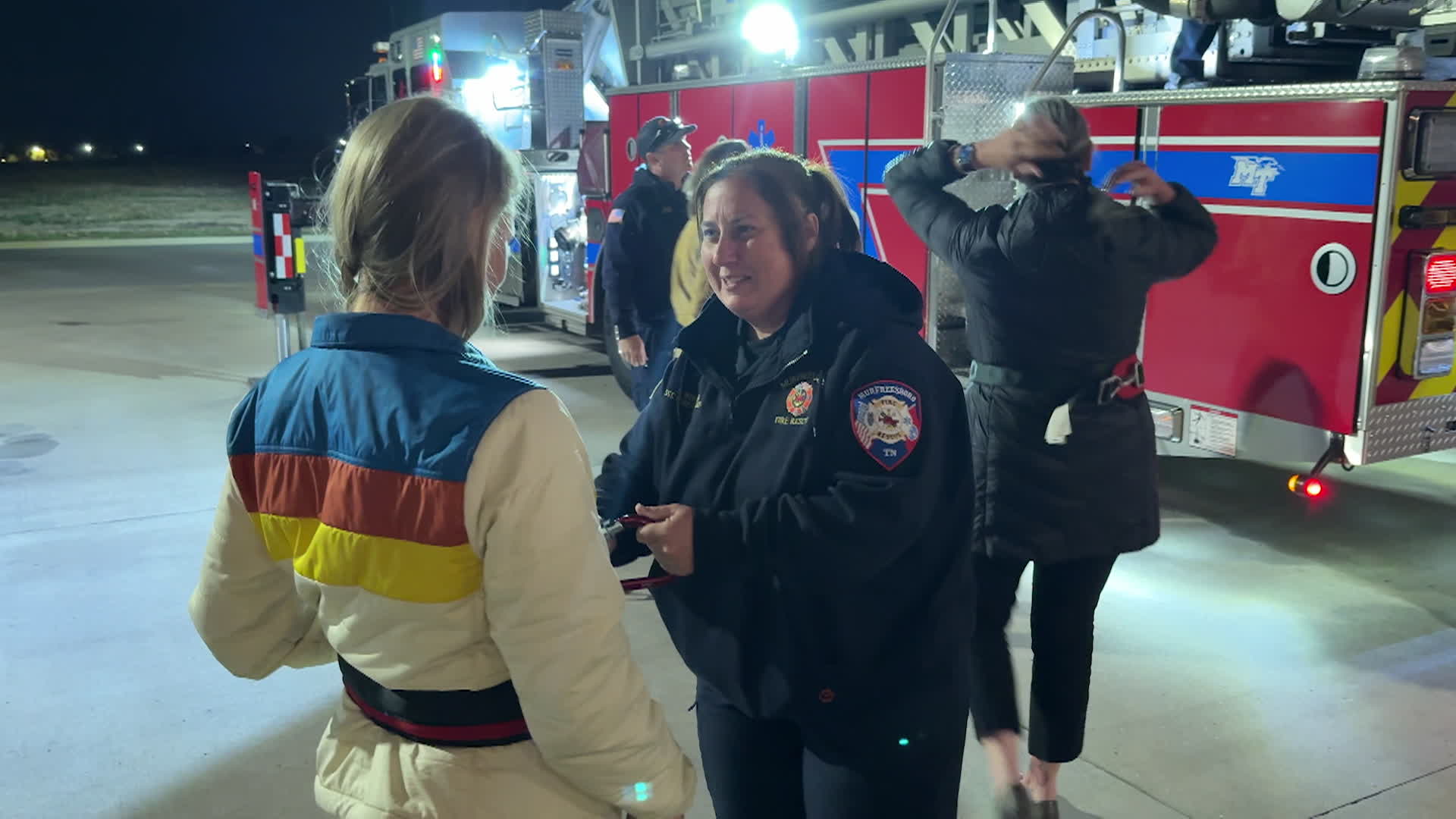 Firefighter helping citizen 
